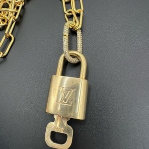 LV lock and key authentic comes with cute chain!